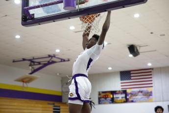 Columbia forward Ty'jahn Wright dunks against Clay on Dec. 7. (BRENT KUYKLENDALL/Lake City Reporter)