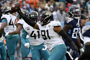 Jacksonville Jaguars defensive end Dawuane Smoot celebrates after recovering a fumble by Tennessee Titans quarterback Ryan Tannehill on Dec. 11 in Nashville, Tenn. (MARK ZALESKI/Associated Press)