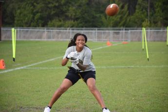 FGC receiver Destiny Lockett looks in a pass during Tuesday’s practice. (COURTESY OF FGC )