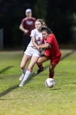 Lafayette’s Jolette Moreno battles with Christ’s Church Academy’s Dani Raulerson during Tuesday’s Region 1-2A quarterfinal. (JACK HOWDESHELL/Special to the Reporter)