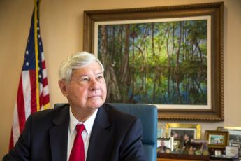 Former Governor and U.S. Senator Bob Graham, seen here in his Miami Lakes office in 2015, was famous for doing workdays alongside everyday Floridians and for obsessively taking notes about the ideas and thoughts people shared with him. (BENJAMIN RUSNAK/New York Times/TNS)