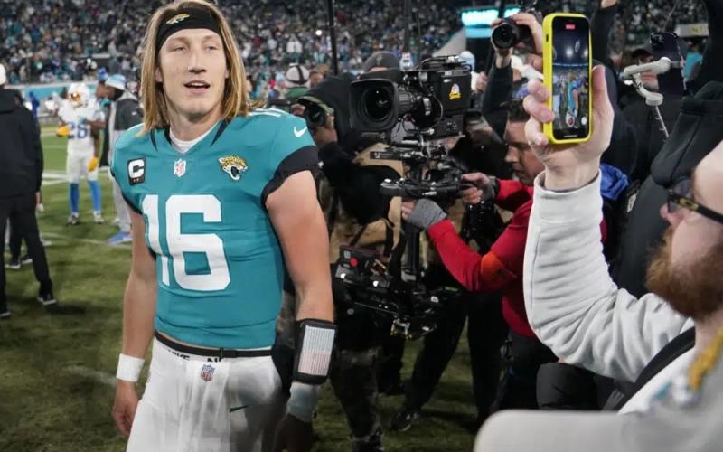 Jacksonville Jaguars quarterback Trevor Lawrence walks off the field after last Saturday's wild-card playoff game against the Los Angeles Chargers in Jacksonville. The Jaguars won 31-30. (CHRIS CARLSON/Associated Press)