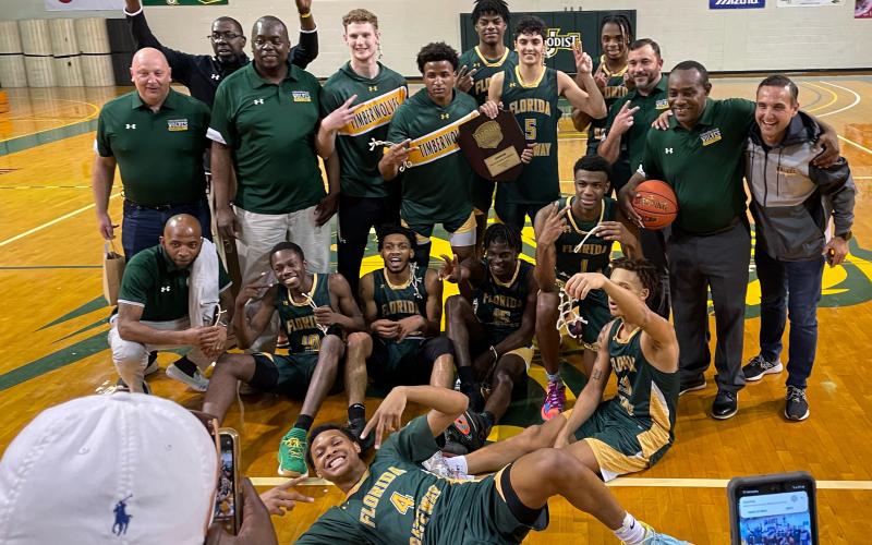 FGC’s basketball team celebrates after defeating Fayetteville Tech to win the South Atlantic District B championship on Saturday. (COURTESY)