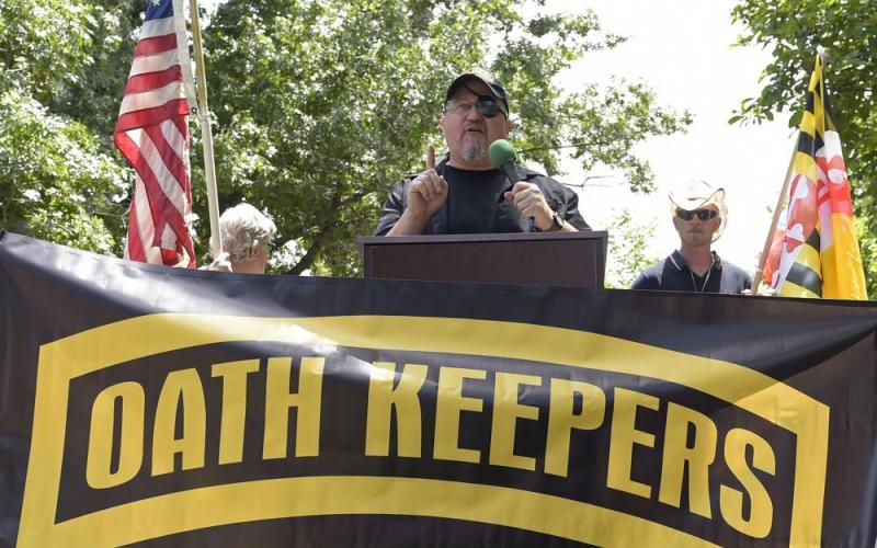 Stewart Rhodes, founder of the Oath Keepers, center, speaks during a rally outside the White House in Washington, June 25, 2017. The trial of the founder of the Oath Keepers and four associates charged with seditious conspiracy in the attack on the U.S. Capitol is set to begin next week. (SUSAN WALSH/AP File)
